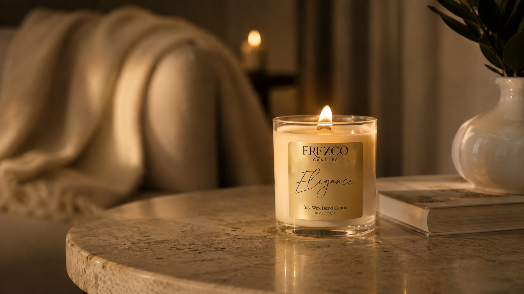 Frezco Candles elegance candle on a marble surface with a blurred background