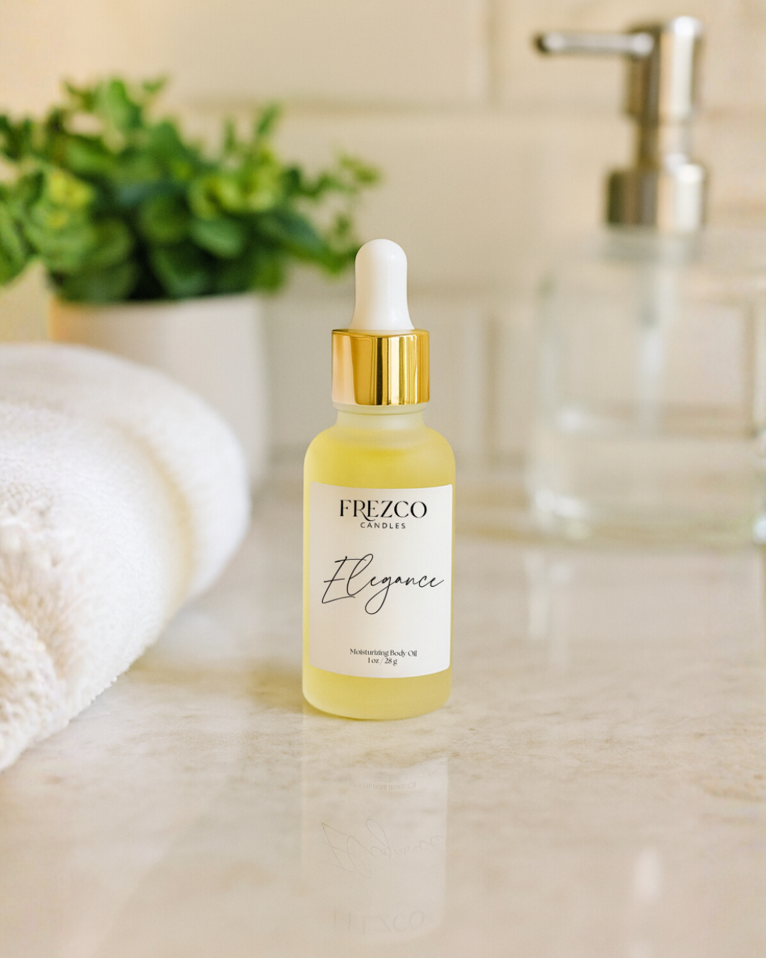 FREZCO Skincare bottle of 'Elegance' serum on a bathroom counter with a plant and towel in the background.