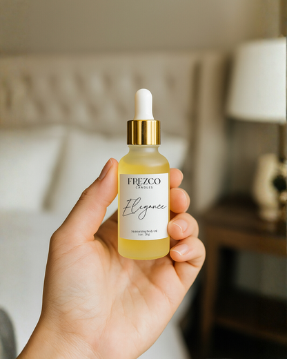 Hand holding a Frezco Skincare bottle with dropper labeled 'Elegance' in a blurred indoor setting.