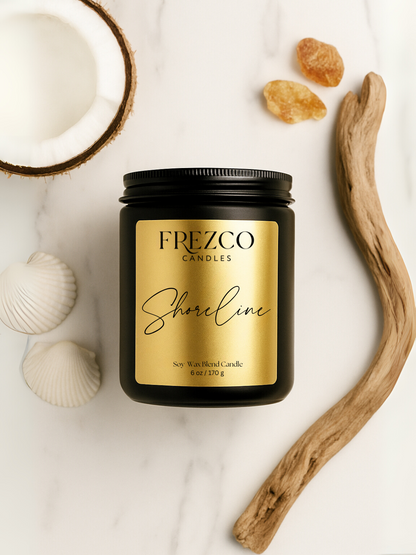 Frezco Candles Shoreline candle with natural elements on a light background