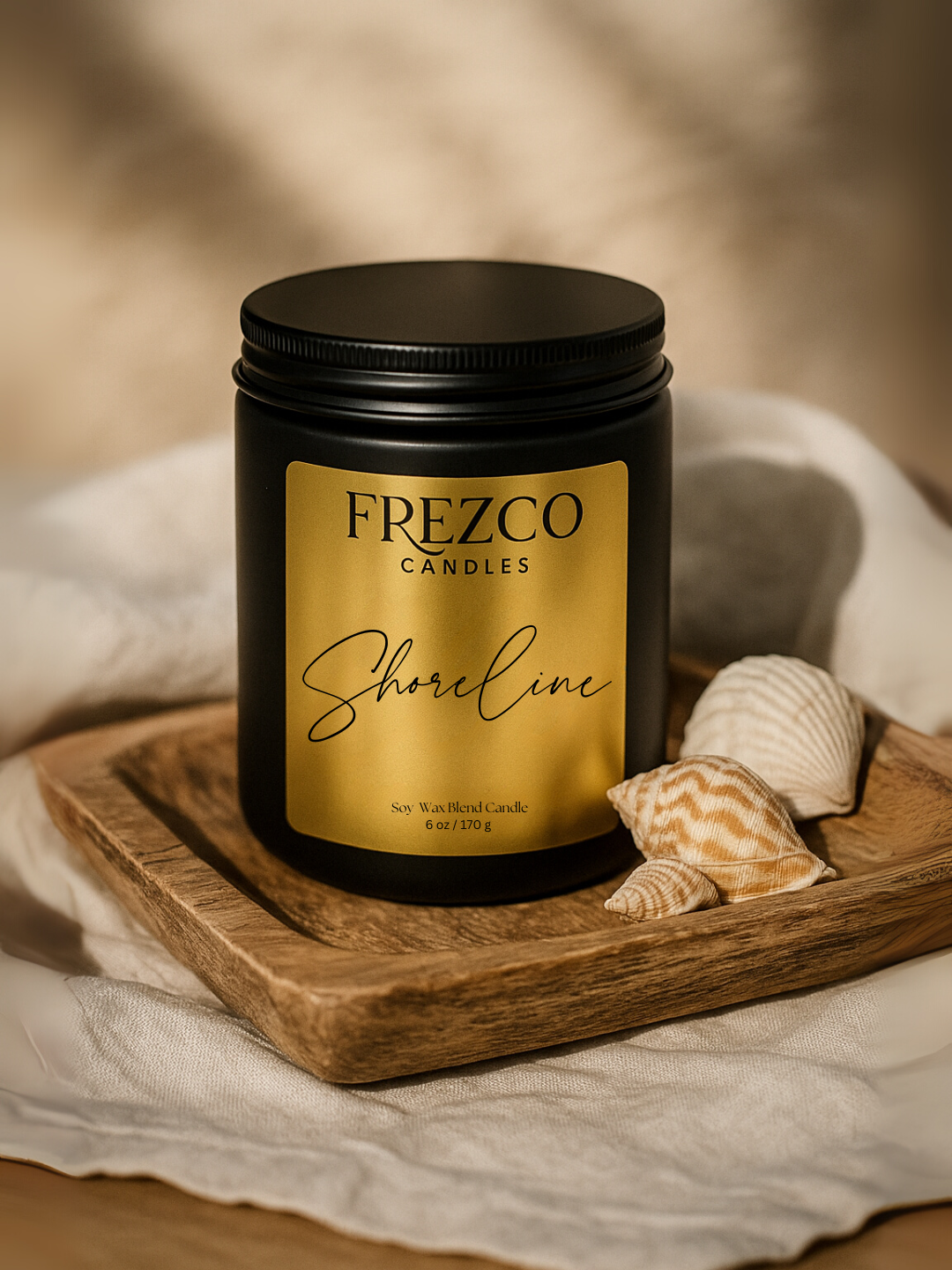 Frezco Candles Shoreline candle on a wooden tray with seashells